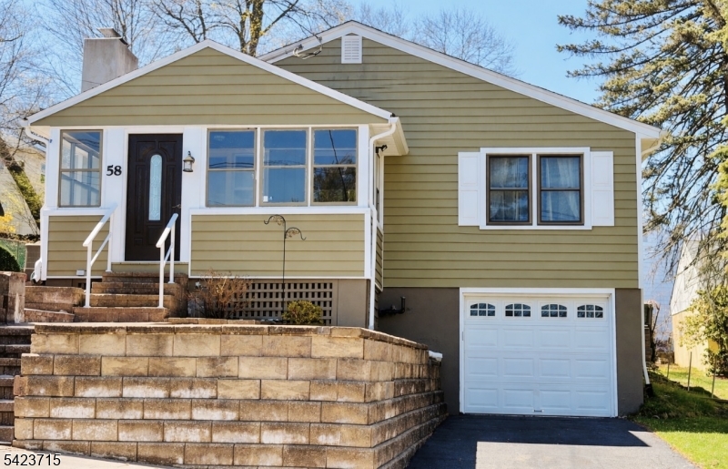 Beautiful ranch located in Dover, NJ. This well-maintained home features a welcoming front porch, hardwood floors throughout, and 3 generously sized bedrooms, all conveniently located on one level. The property offers 2 full bathrooms and a finished basement, ideal for recreation, entertainment, or additional living space. Enjoy outdoor living with a private patio and fenced-in yard. Conveniently located near downtown Dover, schools, shopping, and major routes.Additional updates include newer siding, roof and central air unit.