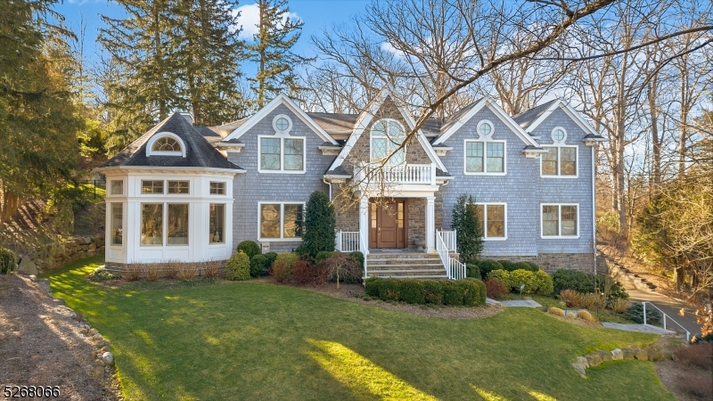 Be prepared to fall in love with this spectacular resale of new construction built in 2016 designed by Thomas Baio, AIA, on .62 acres w/ everything you want - grand 2-story 16' entrance hall, south facing so great natural light, 10' high ceilings on the 1st & lower levels, 9' high ceilings on 2nd level, new high end summer kitchen, perfect for entertaining, & terrific backyard w/ plenty of room for a pool. Open floor plan perfect for entertaining! Stunning gourmet eat-in kitchen w/ huge center island, top of the line Subzero & Wolf appliances & sunlit breakfast area is totally open to family room w/ gas fireplace. French door into an impressive 2-room in-law or guest suite w/ sunny office, custom walk-in closet & full bath. Dramatic 2-story Playroom/Sunroom w/ 16' ceilings. Butler's pantry & spacious dining room w/ elaborate woodwork & great natural light, perfect for entertaining. 2nd level features an incredible primary suite w/ gas fireplace, bright office / sitting room, massive walk-in closet w/ center island & gorgeous spa-like bath w/ soaking tub & Rainforest shower. 4 additional bedrooms, 3 additional full baths & laundry room complete the 2nd level. Lower level has 10' ceilings, state of the art golf simulator, huge exercise room, Nanny's suite & mudroom w/ access to 4-car garage. Owner put in full house generator, security & WiFi. Move right in & enjoy this dream home! Ideally located on a quiet street, walking distance to Deerfield Elementary School (0.4 miles)!