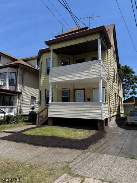 Excellent opportunity for owner-occupants or investors seeking to build equity. This spacious three-family property offers approximately 3,500+ square feet of living space and features Separate Utilities, Two 3-Bedroom units, One 1-bedroom unit, a Large Unfinished basement, and 1 Car detached garage. Improvements include Three New Gas Boilers, Three New Hot Water Heaters, Two Newer kitchens, and Mostly All Newer Windows.  One unit is currently occupied while two units are vacant, providing flexibility for immediate occupancy, owner occupancy, or rental income potential. While the property may require some TLC and updating, it presents an excellent opportunity for cash buyers, contractors, investors, or purchasers utilizing renovation financing such as FHA 203(k), HomeStyle, or similar rehabilitation loan programs.Property is being sold strictly AS-IS. Seller will make no repairs nor provide any credits. Property includes a Shared Driveway providing access to the rear garage area. Buyers are encouraged to conduct their own due diligence regarding property condition, easements, permits, zoning, and municipal requirements.
