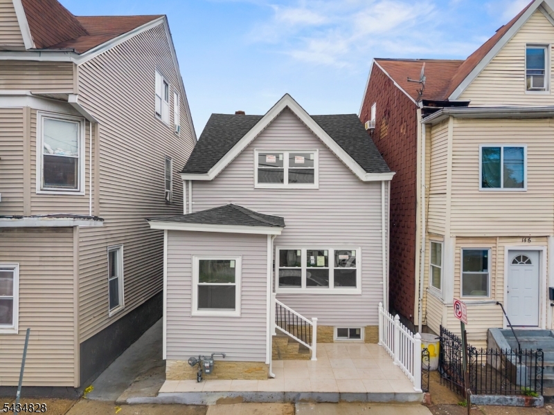 Welcome to 148 Martin Street   a beautifully renovated 4-bedroom, 2 full-bath home in the heart of Paterson. From top to bottom, this property has been thoughtfully updated with quality finishes and modern touches, delivering the ease of new construction without the wait. Step inside to discover an open, airy layout filled with natural light. The renovated kitchen features brand-new cabinetry, sleek countertops, and a full suite of all-new stainless steel appliances   ready for everything from weeknight dinners to weekend entertaining. Both full bathrooms have been completely redone with contemporary tile, new fixtures, and clean, spa-inspired design. Four generously sized bedrooms offer the flexibility every household needs. Updated flooring flows throughout, complemented by fresh paint, new lighting, and refreshed mechanicals for true peace of mind. The fully finished walkout basement is a standout bonus   a versatile lower-level retreat with its own private outdoor access, ideal as a family room, home gym, playroom, or media lounge. Fully finished and ready to use from day one, it adds meaningful square footage that extends the home's livability well beyond the main floors.