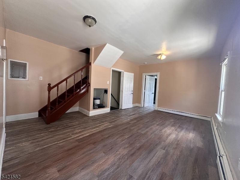 Welcome to this spacious and well-maintained two-story apartment in the heart of Elizabeth! This bright second-floor unit features three generously sized bedrooms, one full bathroom, and an updated living room that offers the perfect blend of comfort and functionality.Ideally located with easy access to major highways, just minutes from the Elizabeth Train Station, and within walking distance of nearby bus transportation, this home offers an excellent location for commuters while keeping you close to shopping, dining, and everyday conveniences.