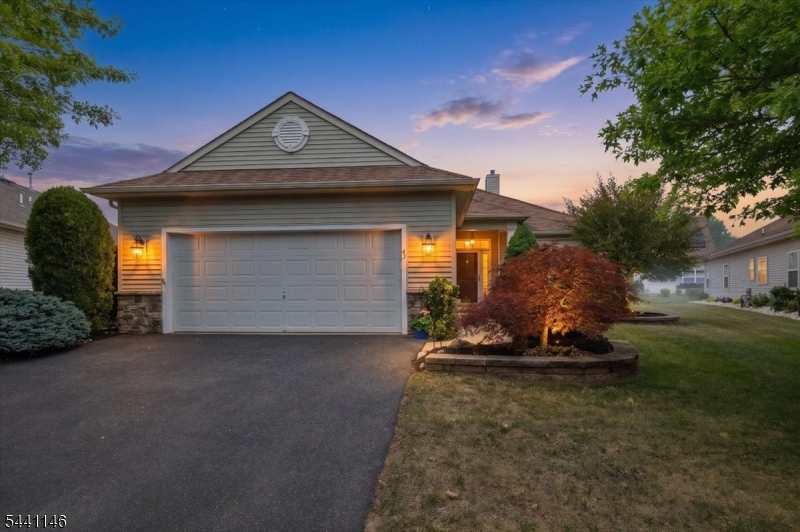 FANTASTIC SPACE & FLOOR PLAN! This Expanded Wellington Model in the sought after Renaissance 55+ Community offers ONE FLOOR LIVING, approximately 2200 square feet, with 3 Bedrooms & 2 Baths! You'll be impressed by the flexible, open floor plan, the beautiful wood floors and 3-sided gas fireplace, which can be enjoyed from the Living, Dining and Family Rooms. The Kitchen & Family Rooms boast cathedral ceilings, breakfast bar & access to the expanded patio.  The patio features an awning and gas line for the grill, and the property is nicely landscaped. The eat-in Kitchen, with maple cabinets, attractive backsplash, and newer dishwasher make cooking and entertaining a joy! The spacious Primary Bedroom has a large walk-in closet, 2nd closet and en-suite bath with new countertop. The 2nd Bedroom and 2nd full bath are located away from the Primary Bedroom, which is ideal for guests!  The 3rd Bedroom/Den is a terrific bonus, with flexibility for guests or home office! The AC unit is less than 8 years, the water heater is less than a year & garage door components are brand new, providing peace of mind!  Start the next chapter of your life in a beautiful community that offers a wonderful new lifestyle. No need for a lawn mower or snow shovel! Enjoy resort-style living with countless activities to participate in year-round! Gated Security, indoor & outdoor pools, sauna, hot tub, tennis, pickleball, fitness center, breakfast and lunch cafe' , billiards, card groups, parties, & more!