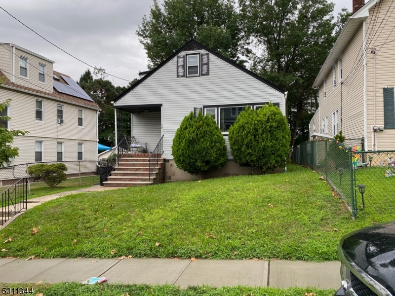 Perfect starter home in Belleville! This house has four bedrooms, 2 full baths, with a large living room and kitchen.  Newer roof and hot water heater.  Plenty of space, plus it backs up to parkland. Property being sold 'as is'.