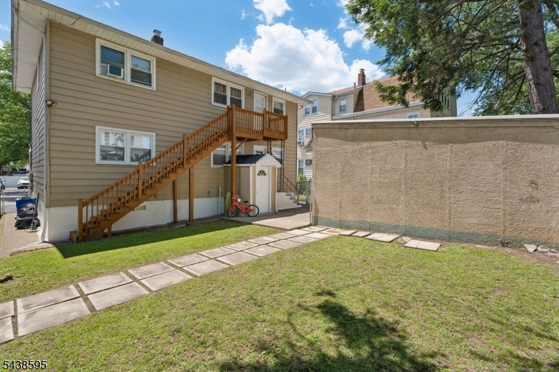 Welcome to 38-40 Rossiter Ave in Paterson's desirable Hillcrest Section! This immaculate, well-maintained two-family home features two spacious 3-bedroom, 1-bath units, making it ideal for both investors and owner-occupants. The first-floor unit includes a finished basement with a full bath, kitchen, and laundry room, offering flexible living space for guests, or recreation. Enjoy a fully fenced backyard, two separate driveways, and pride of ownership throughout. Conveniently located near schools, parks, shopping, public transportation, and major highways. Perfect for owner-occupants looking to offset their mortgage or investors seeking a turnkey property with space, flexibility, and strong income potential. A move-in-ready opportunity you won't want to miss!
