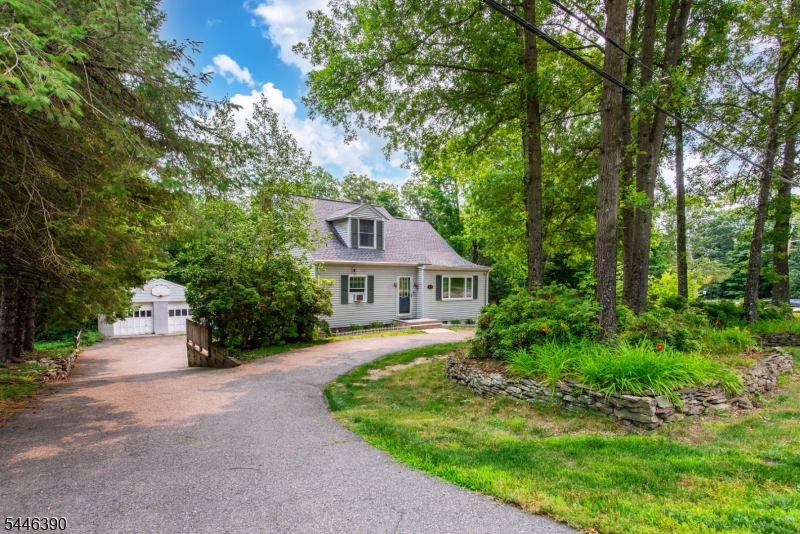 Beautifully maintained 4-bedroom, 2.5-bath home set on over 1 acre, offering the ideal blend of comfort, convenience, and peace of mind. Hardwood floors add warmth and character throughout the home, while thoughtful updates include a new roof installed in 2021, a whole-house generator, and a whole-house dehumidifier. The basement wet bar creates a warm and inviting space for entertaining, and the functional layout makes everyday living both easy and enjoyable. Enjoy the privacy of a generously sized lot with room to relax, play, or entertain outdoors. Ideally located near parks, schools, this move-in ready home is ready to welcome its next owner.