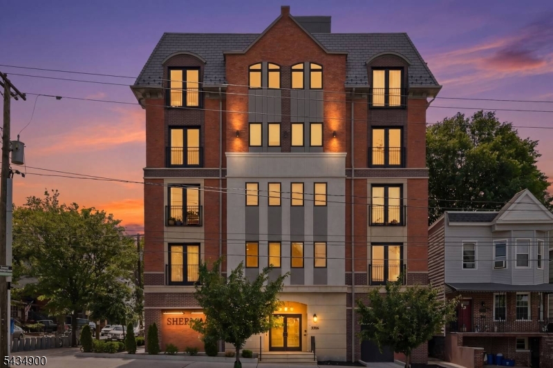Welcome to Sherman Place, a luxury boutique building nestled in the heart of the Heights, steps from the newly restored Leonard Gordon Park - a breath of fresh air, without the upkeep. Unit 404 is a thoughtfully designed two-bedroom, two-bath condo with an open layout that feels both elegant and inviting. Crown molding, recessed lighting, and hardwood floors run throughout. The kitchen features shaker cabinetry, quartz countertops, Caf  appliances, including a gas range, and a center island, making it as beautiful as it is functional. In-unit washer and dryer included.Both bedrooms boast oversized walk-in closets with built-in shelving - because great storage is essential. The primary bath features a double vanity and glass-enclosed shower; the second offers a full tub.Solid concrete construction and sound-insulated walls make Unit 404 a peaceful retreat above it all. The crown jewel of Sherman Place is the stunning rooftop deck with sweeping views of the NYC skyline, the World Trade Center, the river, and the surrounding green spaces, making it the perfect spot to unwind or entertain.Building amenities include elevator access, secure package storage, and indoor bike storage. With a CitiBike station steps away, easy access to NYC bus routes, and walkable distance to restaurants, cafes, and parks, this location truly delivers.A dedicated parking space is available for purchase separately.
