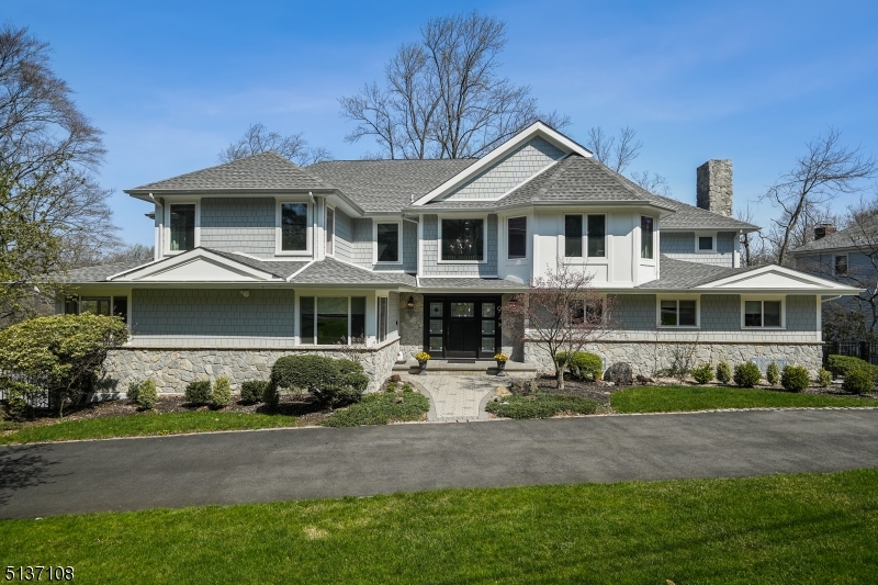 Quintessentially Deerfield custom home fully remodelled and upgraded to an impeccably high standard nestled on almost a half acre lot. In a prime location for Top-Rated Millburn Schools make this a wonderful place to live.  Every fine detail of this house was made to be a forever home.  Meticulously updated throughout with all new major systems to a standard better than today's new constructions and an open concept first level made for entertaining.  A beautiful deck wraps around the first floor and a fully fenced-in yard gives ample space for BBQ's and outdoor entertaining, as well as an electric fence for your furry friends.  A brand new mudroom with cedar closet, conveniently placed by the integrated garage makes this every buyer's checklist home that the market has been waiting for.  Boasting 8 bedrooms (including in-law suite on first floor), 6 full baths, and 1 half bath this home is a perfect mix of modern yet practical suburban living.