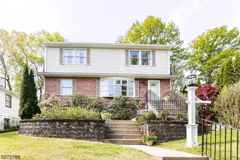 SPACIOUS COLONIAL IN DESIRABLE SEC OF MT ARLINGTON. 4/5 BEDROOMS/ LARGE LIV RM, FAM ROOMS AND EAT IN KITCHEN. LAUNDRY ROOM ON 1ST FLOOR! UPDATED BATHS, NEW FLOORING ON MAIN LEVEL. KITCHEN FEATURES UPDATED APLIANCES, LOTS OF STORAGE, FULL FINISHED BASEMENT FEATURES BAR, POOL TABLE IN REC ARE INCLUDED! UPDATED HEATING SYS W/ READY TO INSTALL CENTRAL A/C. WATER SOFTENER IS NEW (NEVER HOOKED UP) PELLET STOVE AS-IS. LARGE PRIVATE FENCED IN YARD WITH BEAUTIFUL PAVERPATIO, GARDENING AREA, AND MATURE BEAUTIFUL LANDSCAPING THAT FEELS LIKE AN OASIS! SEASONAL LAKE VIEWS OF LAKE HOPATCONG, JUST A FEW BLOCKS FROM COMMUNITY BEACH WITH OPTIONAL MEMBERSHIP, CLOSE TO TRAIN STATION, ROUTES 80,46,10 AND SOO MUCH MORE!