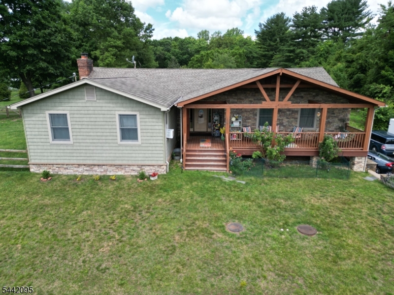 Welcome to this charming 5 bed  2 full bath custom rustic ranch set on just under a full  Acre on a quiet cul-de-sac.Situated on an open level lot in a very desirable area of Rockaway Twp. Wood burning fireplace, custom outdoor space with ceiling fan, great for entertaining or enjoying the natural beauty this backyard offers. Hardwood floors throughout, SS appliances, updated country kitchen with custom cabinets, extra storage, walk in pantry, double wall ovens and granite counter tops, center island with a breakfast bar. Spacious bedrooms with generous closets.Spread out with two living rooms on the first level, as well as a formal dining room. Fifth bed may also serve as an office or den.The basement offers a large  22X13 rec room along with a 22X13 storage room or potential office, workshop,playroom, etc.Two car over sized garage, plenty of parking.Fenced in yard for dogs with easy access from inside the home.Close to major higfhways RT 80, 15 and 23. Enjoy a short walk to Split Rock Resivoir to enjoy hiking trails, fishing and kayaking. Highly rated schools. 4 bed town septic verified.Sale is contingent on sellers securing a home, actively looking. Come take a look at this special home it will not disappoint.