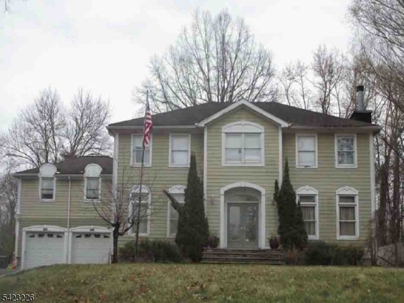 Located in the suburban community of West Caldwell, this Colonial-style single-familyresidence presents a compelling value-add opportunity for investors, contractors, orend users prepared to renovate. The property, built circa 2000, offers approximately3,962 square feet of gross living area, featuring 10 total rooms, 5 bedrooms, and 2.5bathrooms, situated on a generous 20,094 sq. ft. lot. Additional highlights include atwo-car attached garage and traditional Colonial layout. The home is situated alongPassaic Avenue, a main thoroughfare providing convenient access to local schools,parks, houses of worship, commercial amenities, and regional commuting routes.