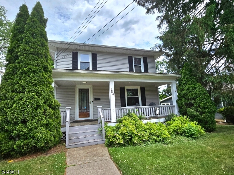 Welcome home to this classic 4-bedroom, 2.5-bathroom Colonial, perfectly situated on a beautiful level lot in desirable Hackettstown. From the moment you arrive, the welcoming front porch hints at the timeless character and meticulous care found throughout this property. Combining historic charm with essential updates, this home features a replaced roof (2022) to give you peace of mind. The functional layout offers plenty of space for daily living and entertaining. The main level flows effortlessly from room to room, while the four bedrooms offer flexibility. Outside, the level yard is perfect for outdoor activities, gardening, or relaxing. The property also includes a highly desirable 2-car detached garage, offering excellent storage for vehicles, tools, or hobbies. Enjoy the convenience of public water and public sewer. Location is everything, and this property delivers. Situated in a commuter-friendly neighborhood, and downtown Hackettstown's vibrant dining, shopping, and community events. Move right in and enjoy the perfect blend of historic character, convenience, and a prime location. Sale Subject to Short Sale Approval, Sale is strictly AS IS