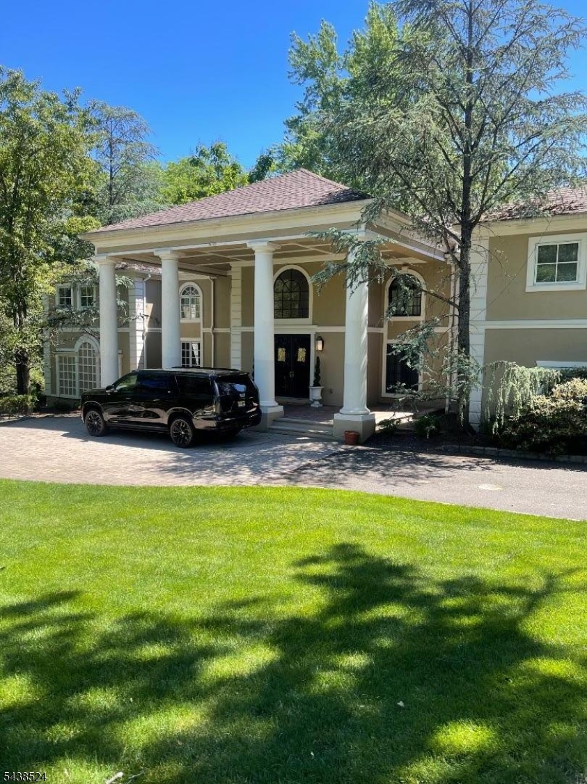 This classic 5 bedroom 6 full and 2 half bath colonial is a must see. Featured for 6 seasons on MTV's Run's house, this custom home offers a stunning grand foyer that flows effortlessly into the great room. The French doors beyond offer views of the Gunite pool and Cabana complete with changing rooms and a full bath and the lawns beyond. Adjacent the great room is the custom Italian gourmet kitchen which hosted the cooking channel's Rev Run's Sunday Suppers for 4 seasons. The highly acclaimed Rev Run's Renovations which ran for 2 seasons offered viewers the rare opportunity into this magnificent renewal. These include an amazing primary suite, recording studio, hair salon and home theatre. Located approximately 1 hour from NYC. Gated and private this home sets the tone for the most discerning buyers.