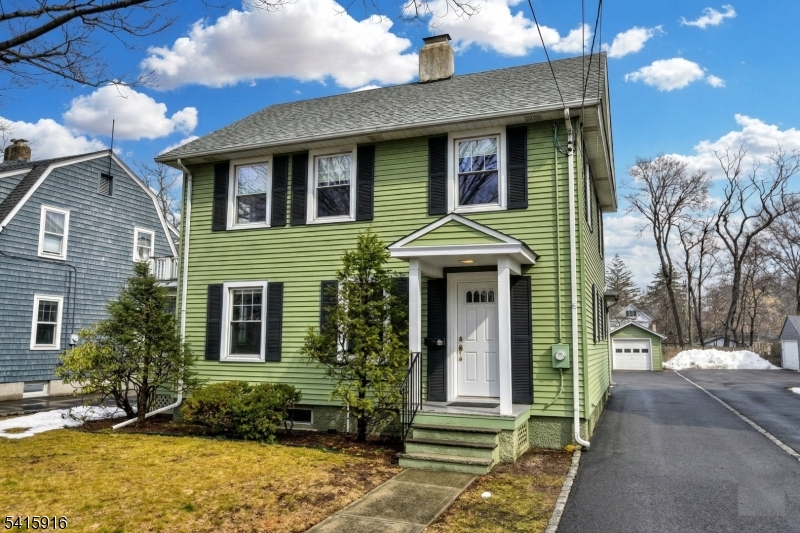 Presenting a rare opportunity to lease a charming Colonial home near the heart of downtown Ridgewood.  This home, with its timeless architectural character, includes crown moldings, custom built-in bookcases, and a fireplace that creates a warm, welcoming environment for friends to gather.  A newly renovated kitchen and bath offer modern convenience and comfort while the side porch provides additional space for quiet relaxation. Conveniently located near the train, bus routes, restaurants and schools, there is also plenty of on-site parking for up to 6 cars.  The backyard features a detached garage with additional storage, a bluestone patio and a deep yard for summer fun!