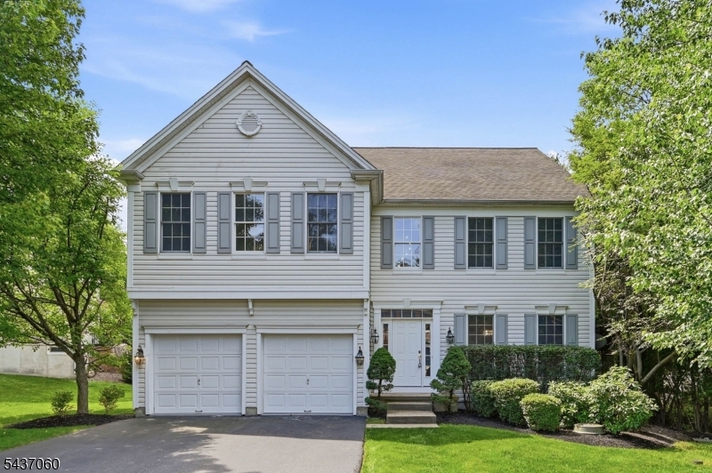 Beautifully maintained and thoughtfully updated, this spacious Center Hall Colonial offers approx. 4,500 sq ft of living space across 3 levels with 5 bedrooms and 3.5 bathrooms in the sought-after Brookside Estates community, known for its highly regarded school district. Built in 2003, the home blends timeless design with renovations completed in 2026, featuring fresh interior paint, new hardwood flooring throughout the house, updated kitchen and bar area with new quartz countertops, designer light fixtures, a new powder room, and a fully finished basement. Tall ceilings and an open layout create a strong first impression, leading into a dramatic two-story family room filled with natural light and anchored by a fireplace. The inviting main level offers generously sized living and dining spaces ideal for everyday living and entertaining, while the kitchen features a breakfast nook and seamless flow into the main gathering areas. A first-floor bedroom or office is ideal for guests or working from home. Upstairs, four spacious bedrooms provide comfort and privacy, including a generous primary suite. The finished basement with a built-in bar further expands the home's living space with endless possibilities for recreation, media, fitness, or entertaining. Additional highlights include a fenced backyard perfect for outdoor enjoyment, ample storage throughout, and a desirable location close to schools, parks, and shopping. Underground irrigation system in the front and backyard.