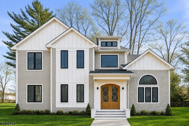 A masterclass in modern luxury, this exceptional NEW CONSTRUCTION Center Hall Colonial offers 6 bedrooms and 6.5 baths, set on a level 0.36-acre lot in one of Florham Park's most desirable neighborhoods. Spanning approx 6,200 sq ft across three beautifully finished levels, this residence blends timeless design with elevated finishes throughout. A custom luxury-grade entry door opens to a grand two-story foyer, flanked by formal living and dining rooms. The sun-drenched family room with stunning gas fireplace flows seamlessly into the chef's kitchen featuring premium panel-ready appliances, an expansive quartz island, quartz backsplash, walk-in pantry, bar area, and bright breakfast nook. Glass doors lead to a patio and spacious backyard for effortless indoor-outdoor living.The main level includes a private en-suite bedroom with WIC, dedicated home office, powder room with Carrara marble vanity, mudroom, and direct access to a 2-car garage. Upstairs, four en-suite bedrooms include a luxurious primary suite with dual WICs, sitting area, and spa-like bath, plus a convenient laundry room.The finished lower level offers a rec room, media lounge, office, bedroom, and full bath. Custom millwork, designer lighting, and a 10-year New Construction Warranty complete this exceptional home, ideally located near highways, shopping, and dining.