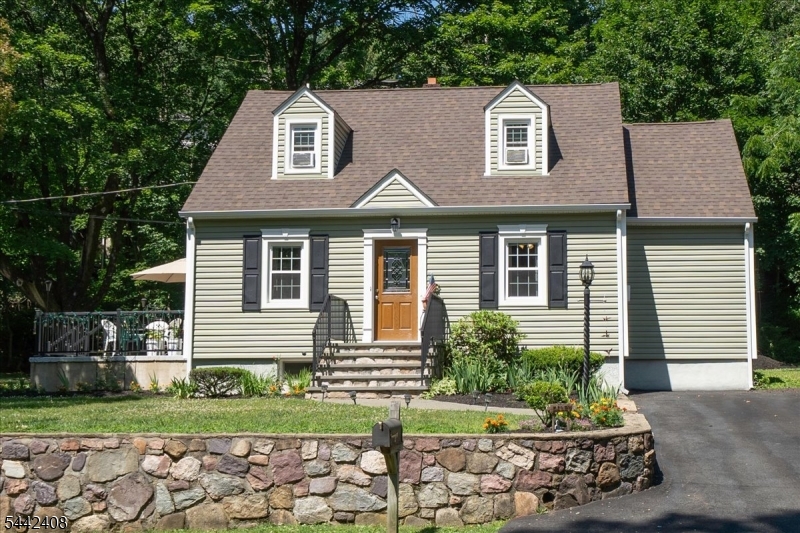 This well-maintained 4-bedroom, 2-bath home offers comfort, space, and convenience. Featuring a desirable first-floor primary bedroom, this home is perfect for flexible living. Upstairs boasts newly installed carpeting and fresh paint, creating a bright and updated feel throughout. Enjoy the expansive yard ideal for entertaining, gardening, or relaxing complete with a large shed. Conveniently located within walking distance to town and close to parks and a nearby lake for your swimming enjoyment. Truly move-in ready just pack your bags and settle in!