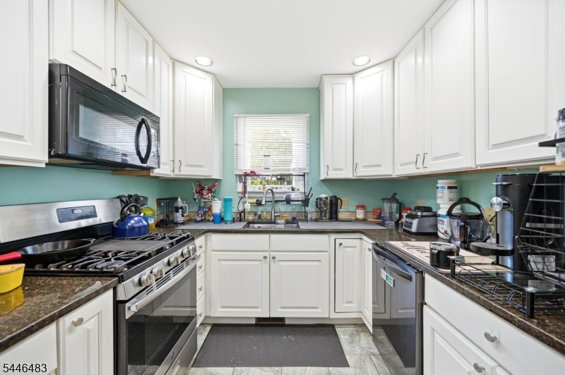 Welcome to this beautifully maintained 4-bedroom, 2.5-bath Colonial, perfectly situated on a peaceful dead-end road in one of Rockaway's most desirable neighborhoods. Enjoy the best of both worlds with a quiet residential setting that's just minutes from shopping, restaurants, major highways, and mass transportation for an easy commute.Inside, a thoughtfully designed floor plan offers the flexibility to adapt to your lifestyle, with spacious living areas and versatile spaces that can easily accommodate a home office, playroom, fitness area, or whatever your needs may be. The inviting layout is ideal for both everyday living and entertaining.Step outside to your own private retreat featuring lush, level lawns, a spacious deck for outdoor dining, and a cozy fire pit perfect for relaxing evenings under the stars. Whether you're hosting gatherings or simply unwinding in the peaceful backyard, this home offers the space and setting to enjoy every season.