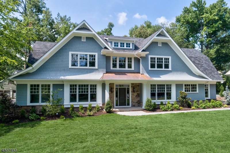 Custom new construction w/modern flair in sought after neighborhood, blocks to train/town! Chic NYC style design at every turn-built w/the utmost attention to detail & finest materials w/10' ceilings & wide plank oak floors t/o 1st lead to Liv Rm, formal Din Rm w/Butler's Pantry access & central Kitch, high-end appliances & oversized center island w/breakfast bar. Fam Rm w/focal gas fireplace! 2nd lvl boasts lux MBR suite w/sitting area, ensuite marble bath & dual walk-in closets. Conveniently located 2nd fl Laundry Rm. Expansive LL w/Rec Rm, Media Rm, Exercise Rm, Game rm, potential wine cellar & ensuite guest rm! Don't miss this rare opportunity to make this one of a kind, spectacular new home yours!