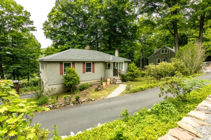 Enjoy peaceful lake views in this charming 3-bedroom Raised Ranch in the desirable Lake Lenape community. This home offers year-round water views and a bright, welcoming layout. The spacious eat-in kitchen features stainless steel appliances and overlooks the lake, perfect for everyday living or entertaining. Recent updates include new floors installed this year, an updated bathroom, new lighting, a roof approximately 5 years old, repaved driveway, updated washer and dryer, water softener and more. Natural gas has also recently been connected to the home, adding valuable convenience and efficiency. Just minutes from Lake Lenape's beach and recreation swimming, fishing, kayaking, and more you'll enjoy true lake living with convenience. Close to Route 206, Route 94, and I-80 for easy commuting. A perfect full-time home or weekend retreat offering comfort, updates, and beautiful lake views.