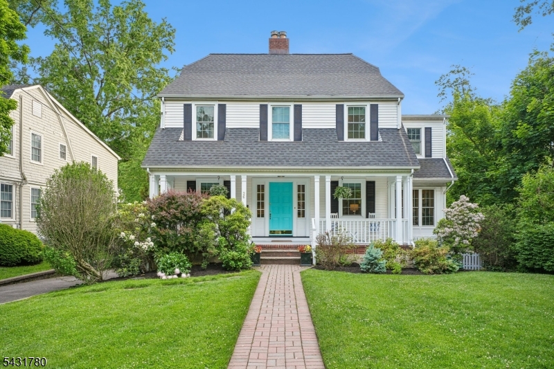 Set on an expansive, flat property just a short walk from town and trains, this beautifully maintained 4-bed/4.1 bath Colonial offers the perfect blend of comfort, space and easy indoor/outdoor living. First floor features a bright living room with custom built-ins surrounding a wood-burning fireplace, opening into the adjacent family room and screened-in porch overlooking the backyard. The formal dining room includes sliding doors to the elevated mahogany deck, the eat-in kitchen also provides direct deck access   creating a seamless indoor/outdoor lifestyle perfect for entertaining complete with a convenient powder room.Upstairs, the second floor offers generously sized bedrooms with abundant closet space, including a spacious primary suite with updated bath featuring radiant heated floors and double sinks. The hall full-bath has been renovated as well. The third floor includes new carpeting along with an additional full bath featuring a separate shower and tub   ideal for guests, office space, or a private retreat.The finished basement adds even more flexible living space with a full bath, recreation area, exercise space, and storage. Additional highlights include triple-pane windows, brand new 2-zone central AC, and a 5-year-old water heater.Outside, the backyard offers a true retreat with expansive flat lawn space, mature landscaping and elevated deck accessible from the kitchen, dining room and screen-in porch. A wonderful opportunity in a highly desirable location!
