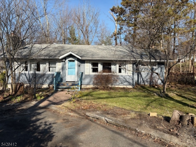 Investor, Cash Buyers, 203 loans. A rare opportunity you don't want to miss. This 3-bedroom, 1 bath Ranch tucked away on a peaceful cul-de-sac. This home offers tremendous potential for the right Buyers.  Surrounded by nature and a short distance from Lake Tamarack. Inside you'll find original hardwood floors, cozy stone fireplace, Eco heat pump system, eat in kitchen making the dining room into a bonus room providing natural lighting coming through a skylight with high celling's, including a double glass sliding door onto a deck.   Septic Failed, Sold AS Is. Due diligence for Lake due, all association fees and by laws. Bring your dream to life, redesign and customize your own getaway home. Some Photos are Ai