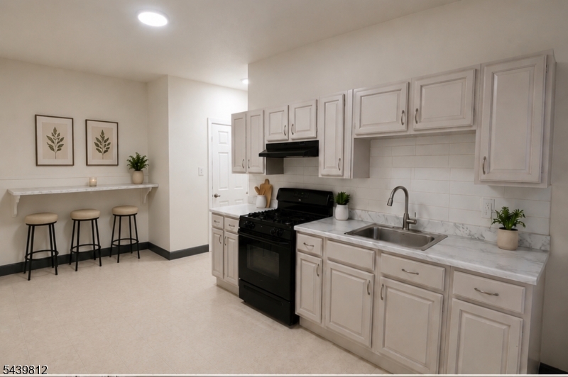 Welcome to this newly renovated, sun-drenched 3-bedroom home, boasting 10 ft ceilings and elegant gray hardwood floors. Features include three oversized bedrooms, a massive eat-in chef's kitchen, and a prime location just steps from transit only 25 minutes to NYC and 10 minutes to Newark Airport! First Floor Unit. SECTION 8 IS WELCOME. PETS ARE WELCOMED.