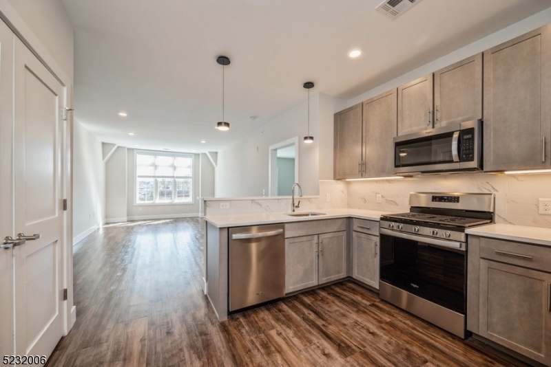 New construction luxury units in downtown Madison. Various floor plans available, luxury finishes, quartz counters, laundry in-unit, large windows offering a lot of natural light and considerable closet space. Unit includes assigned garage parking space with inside entrance, a 208cu.ft. storage unit and access to a bike storage room on site. Walking distance to NJ Transit train & all that downtown Madison has to offer!
