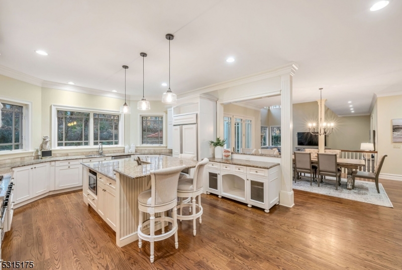 This exquisite Chester estate on one of the town's most coveted streets presents a rare opportunity to experience luxury living at its finest. The home is an architectural masterpiece, boasting high soaring ceilings and an open floor plan designed to impress. The primary suite is conveniently located on the main floor along with an additional en-suite bedroom offering convenience and versatility. Two of the six en-suite bedrooms are located on the main floor. Four other en-suite bedrooms are located on the second floor, two of which have large sitting rooms.The gourmet kitchen is a chef's delight, equipped with top-of-the-line appliances, granite counter tops, and ample storage space. The large bedroom suites offer breathtaking views of the valley, while the beautifully landscaped grounds provide a serene and tranquil environment for relaxation and entertaining. Custom trim work, hardwood, and tile flooring add to the home's elegance, providing a luxurious living space that is both comfortable and sophisticated. This home sits on 3.6 acres with a backyard that has endless possibilities. This meticulously maintained property offers everything you need to move in and start enjoying the lifestyle you deserve. The expansive high-ceiling basement with plumbing for a full bathroom presents limitless potential. **As per owner, there is plenty of room for a pool/pool house.(see documents for drawing)