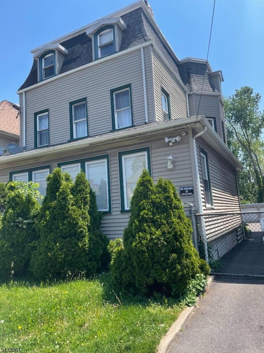TWO FAMILY HOME WITH GARAGE AND DRIVEWAY, SECOND FLOOR  HAS THE USE OF THE ATTIC EXTRA SPACE FOR STORAGE. A MUST TO SEE , NEAR KEAN UNIVERSITY, CLOSE TO TRAIN AND MAJOR ROUTES AND OTHER PUBLIC TRANSPORTATION. AN EXCELLENT OPPORTUNITY FOR BOTH AND OWNER OCCUPANTS.  NEED