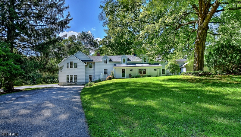 Living is easy in this tastefully renovated 4 bd - 4.5 bath colonial home perfectly situated in the midst of 8.3 acres of park like property. Stately light filled rooms, an open floor plan, neutral tones throughout, high ceilings & exposed beams. Prepare stellar meals in this chefs delight country kitchen, replete with commercial Vulcan range, center island, farm sink & SS appliances. All bedrooms are generous sized en suites with sitting areas & ample closet space, including a bonus Au Pair/guest suite w/ a full kitchen. Enjoy garden parties under the wisteria covered pergola or relax on the oversized deck overlooking the picturesque barn & pond w/ enchanting fountain and footbridge. Exceptional county living driving distance to Poconos and NYC, shopping and more! Great potential for Airbnb. Also for Rent.