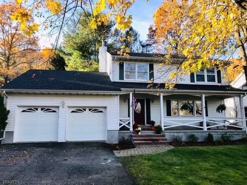 Well maintained and upgraded colonial! Lemonade porch welcomes you into this beautiful home with large rooms and a great flow. Picture window lets the sunshine pour in and fill the space with light. Eat-in-Kitchen with newer granite counters & back splash, stainless steel appliances & a door leading to the patio offers the perfect layout for entertaining. Upgrades include a newer roof, front steps, boiler, A/C, wood floors, carpet & some windows upstairs. Laundry on the 1st floor, separate dining rm, family rm off kitchen, & a spacious foyer. 2nd floor has bright & spacious master bedroom & full bath plus a walk in closet.  Plus 3 additional bedrooms & a full bath. Location is perfect for commuting, direct train and bus service to NYC.  Walking distance to downtown Denville, filled with restaurants & shops.
