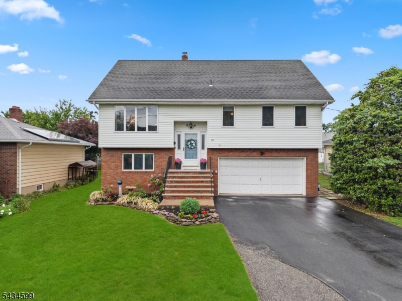 Space, privacy, and location all under one roof. That's exactly what this stunning bi-level home delivers. nestled in the desirable Richfield section of Clifton, NJ, this 6-bedroom, 4 full bath gem offers the perfect blend of space, flexibility, and convenience.The expansive layout features a primary suite complete with a private full bath, providing a serene retreat at the end of the day. A standout feature of this home is the self-contained in-law suite with its own private entrance - ideal for guest .With 6 generous bedrooms and 4 full bathrooms, there's room for everyone to live and grow comfortably. The 2-car garage adds everyday convenience along with ample storage space.Location is everything and this home delivers. Situated close to top-rated schools, parks, houses of worship, and NJ Transit, commuting to New York and running daily errands has never been easier.Whether you're a growing household or savvy buyer, this Clifton gem checks every box. Don't miss your opportunity to make it yours!
