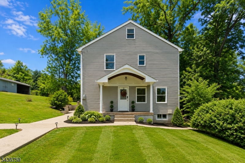 Who says you can't have it all? Nestled on a quiet street in desirable Gillette, this 4-bedroom, 2-bath Colonial is packed with charm, character, and space to spread out. Picture cozy winter nights gathered around the wood-burning stove, lively game nights in the bonus family room, and summer weekends spent grilling and entertaining on the backyard deck. Thoughtful details throughout create a warm and inviting atmosphere, while the flexible layout offers endless possibilities for today's lifestyle. Conveniently located near I-78 and I-287, commuting, shopping, dining, and recreation are all within easy reach. Being sold as-is, this home presents a fantastic opportunity for buyers to add their own personal touches and create the home they've always envisioned. Whether you're looking to move right in or gradually make it your own, this property is the perfect canvas to transform into your dream home. Warm, welcoming, and full of potential this is the kind of place where lasting memories are made.