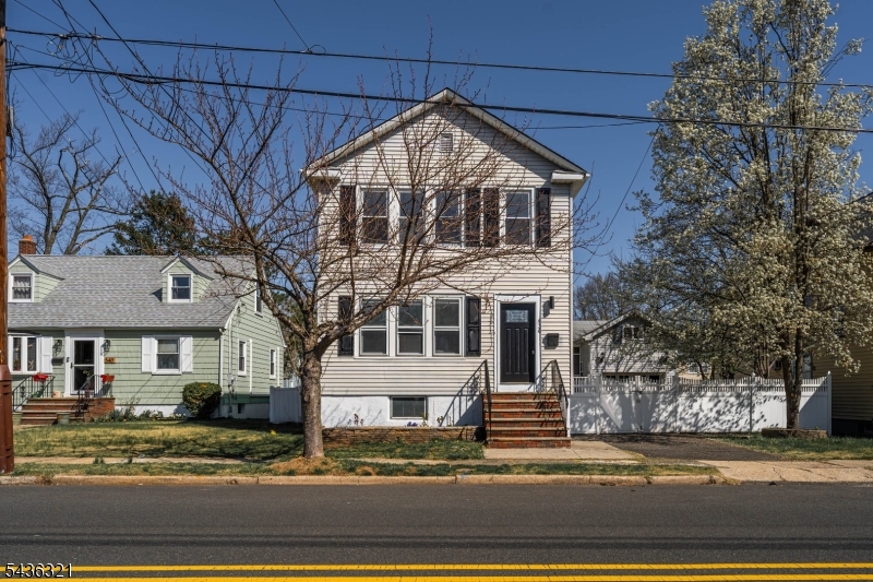 **Welcome to your dream home in the heart of Garwood!** Freshly renovated from top to bottom, this stunning **3-bedroom, 2 full bath residence** effortlessly blends modern style with everyday comfort. As you step inside, you're greeted by a **sun-drenched living room** with ample space to relax and entertain. The flow continues into a **generously sized dining area**. The **open-concept kitchen** is the true heart of the home, featuring sleek finishes, ample cabinetry, and a layout that invites connection. Need more room to spread out? The **expansive, high ceiling, family room with a fire place is everything!** offers endless possibilities for your convenance. Outdoors, enjoy a **private backyard ** . A **dedicated fenced in garage is available** provides added convenience and storage. Enjoy this house while still having access to a downtown that offers lifestyle, **steps from charming downtown Garwood**, you'll find yourself surrounded by local shops, restaurants, and community events. Commuters will love the quick access to **major highways, NJ Transit, and top-rated schools**, making this location as practical as it is picturesque. This is more than just a house it's a lifestyle. Come experience everything this home has to offer!