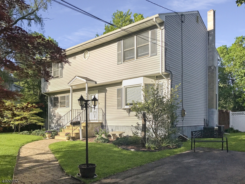 Great Large Colonial in Sterling NJ with a large fenced in yard on a corner lot!  Large swimming pool is perfect for Summer BBQs and entertainment. Gazebo and two story deck make this a perfect home for indoor and outdoor living.  Two bedrooms downstairs and two bedrooms upstairs.  Each upstairs bedroom has a separate room perfect for an office or game room.  Perfect for in-law suite if needed with bedroom, living room with kitchenette and full bath.  Lots of storage in this home.  Finished basement as well.  Close to NYC trains, local shops, restaurants and top notch school systems.  Low taxes.  Comes with a Home Warranty but sold as is.  New Furnace just installed.