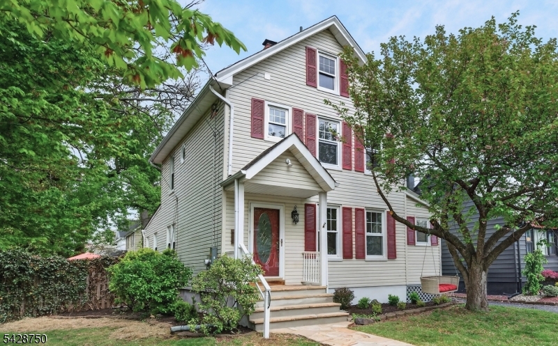 Best Buy in Town!! Welcome to this completely renovated home in desirable Dunellen, where classic charm meets fresh, modern updates. Freshly painted throughout, the home features refinished hardwood floors, new carpeting throughout the second floor, classic trim and moldings, and a beautifully restored and painted tin ceiling in the dining room that adds timeless character. The main level offers an expansive layout with a spacious living room, elegant dining room, new kitchen, laundry room, powder room, and oversized family room with new sliding doors to the back deck. Standout features include the showstopper tin ceiling in the dining room and the new kitchen showcasing granite countertops, hardwood floors, and new stainless-steel appliances. Upstairs, you'll find three well-appointed bedrooms and the main bath. Outside, the fenced in backyard adds to the appeal with a large deck, paver patio, and plenty of yard space for entertaining, relaxing, or gardening. A private double-wide driveway provides ample off-street parking. Additional highlights include thermopane windows and a newly upgraded 200-amp electric service. Ideally located near downtown Dunellen, shops, dining, parks, and the train station, this move-in ready home offers charm, updates, and everyday convenience.