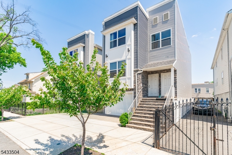 NEWLY BUILT, UNIQUE two-family featuring a rare ground-level unit with 2 rooms and a full bath, home office, or added flexibility. The definition of turnkey, located in Newark Built by an experienced builder with no expense spared, showcasing quality craftsmanship, modern finishes, and thoughtful design throughout. ideal for Owner-occupants or investors seeking low maintenance, strong rental appeal, and long-term value in a high-demand location close to major transportation, shopping, and dining. come turn this house into a home before someone else does!