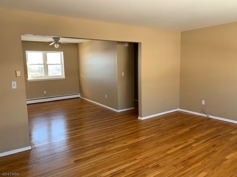 WHY RENT?!! Sweet 2 bedroom second floor condo with gorgeous hardwood floors, dining room, spacious living room and city views from unit! Maint fee includes heat,water,sewer and common area items. One of the best priced 2 bedroom unit in Mt Club. Open living room and dining room area - 2 generous size bedrooms, full bath and some good storage. View of sunrise and city with the rear windows makes this a very desirable location. Basement storage and laundry in building. Assigned parking space and more. Windows in unit are as-is. Wall A/C units stay with unit.