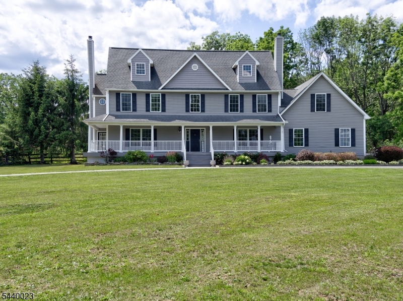 Must See!!! Welcome to this beautifully maintained Colonial offering functionality and style, set on picturesque 3.88 acre lot with breathtaking mountain views. This spacious home features four generously sized bedrooms, 2.5 baths and ample closet space throughout.The main level offers a welcoming living room, family room, formal ding room and kitchen featuring granite countertops and SS appliances. The impressive primary suite serves as a private retreat, complete with jetted tub, separate shower stall, dressing room, oversized walk-in closet and an additional bonus room currently used as a gym. Additional interior highlights include a convenient laundry room, unfinished basement with high ceilings offering endless possibilities, a full stand-up attic for abundant storage and a three car attached garage with inside access.Step outside and enjoy the peaceful surroundings from the paver patio with built in fire pit, perfect for entertaining or relaxing.Double shed and chicken coop included.The home is equipped with a generator hookup for added peace of mind. Conveniently located just 10 minutes from the train station with service to NYC and close to shopping and dining.This property offers the best of country living with commuter friendly convenience. Home is being sold "As- Is with no known issues"