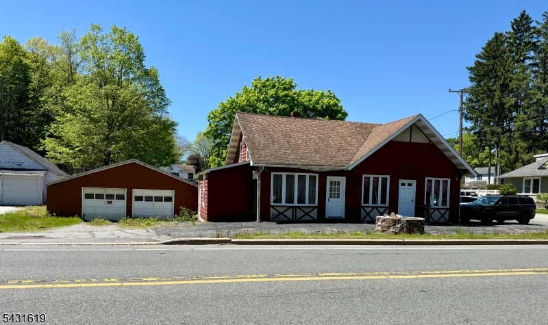 Bring your vision and creativity to this unique opportunity situated on a desirable corner lot in Newton! A convenient commuter location as well as your every day trips to town, plenty of options for dining, and close to town events! Formerly operated as a beauty salon, this property offers endless potential for an entrepreneur, investor, or buyer looking to create an income-producing property while living on-site.The residential space offers the potential for 3 bedrooms, an eat-in kitchen, and a full bath, while the commercial space is perfectly suited for another salon or other approved use, including it's own half bath and office space. Plenty of parking on both sides of the building! In need of TLC and restoration, this is the perfect chance to bring a property back to life and make it your own. Endless possibilities await!