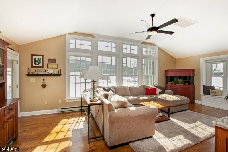 Open floor design gives way to fabulous views of the farm from all levels. High-end eat in kitchen withinduction cooktop, granite countertops, SS ovens, microwave, and built in refrigerator. Hardwood floors throughout main living area, 2 master suites. Updated baths with custom cabinetry. Aztec deck with pergola and shade canopy look over pastures. Workshop off garage w/ added storage space. Family/entertainment room with custom cabinetry with built in entertainment center and side custom cabinetry. Storage room Farm assessed with 8 pastures. Horse facility with 5 stall horse barn, hay loft and tack room, round pen and riding ring. Loafing shed set up for livestock, inside chicken Coup, outdoor enclosed aviary. Hay shed, equipment shed, 7 sheds/run ins. Barn and loafing shed have water, electric, lighting.