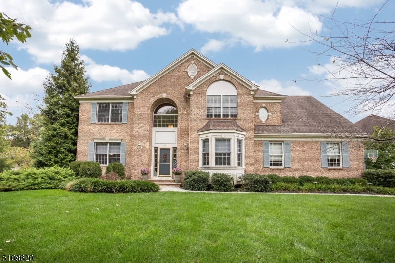 Amazing opportunity to live in this desirable Contemporary Colonial located in the Whippany section of Hanover Township  known for low taxes & excellent schools. Situated in an ideal neighborhood, this 4 bedroom home offers an open, airy layout, nestled on a corner property. The double story foyer welcomes you into this warm, inviting home. Gleaming hardwood floors & an array of beautiful finishes. First floor is an entertainer's paradise featuring a LR, DR & an office. It opens to a towering great room with large floor-to-ceiling windows, a two-sided gas fireplace & a solarium. Spacious gourmet kitchen with granite countertops & a center island that opens to a breakfast area with sliders to the deck. Step outside onto the deck overlooking the lush back yard & beautiful pool. Powder room, 1st floor laundry room & access to the attached garage. Upstairs, the primarybedroom suite features high ceilings, 2 walk-in closets & luxurious private bath w/ heated floors, a spacious shower & dual vanities. 3 additional bedrooms on this level, along w/a full hallway bath. The finished lower level provides plenty of room for entertaining with a spacious great room, a good-sized room presently being used for a gym & a powder room. Hanover Township has a beautiful town pool (additional fee), community center, before/after school programs. Easy access into downtown Morristown & Convent Station NYC Midtown Direct Train.