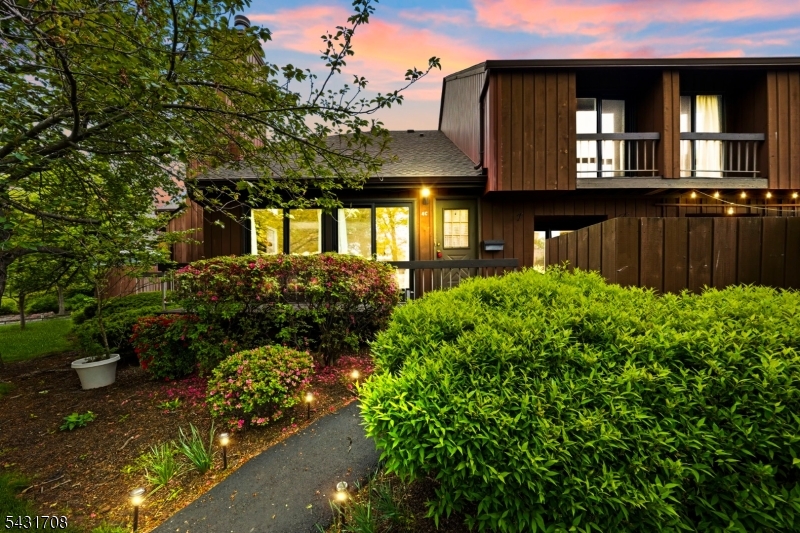 Discover the perfect blend of elegance and comfort in this stunning open-floor-plan townhome, within Hillsborough's prestigious Blue Ribbon school district. From the moment you step inside, you are greeted by soaring two-story vaulted ceilings that create an expansive atmosphere. The main level flows seamlessly from the inviting entry into a formal dining room, perfect for hosting dinner parties, and a spacious family room bathed in natural light. The second level features a versatile loft overlooking the family room, offering the ideal space for a home office, library, or cozy den to suit your lifestyle. The retreat-like master bedroom boasts its own private ensuite bathroom, providing a serene sanctuary at the end of the day. A second spacious bedroom and an additional full bathroom ensure plenty of room for guests. The home includes a dedicated laundry room, one-car garage, and a basement perfect for all your extra storage needs. Recent updates including new windows and a new sliding glass patio door that leads to your private, fenced-in concrete patio a lovely spot for morning coffee or outdoor relaxation. As part of this community, you'll enjoy access to fantastic amenities, including a swimming pool, playgrounds, and tennis courts. Perfectly situated for an active lifestyle, you are just moments away from major highways and only one hour from the excitement of NYC. This move-in-ready gem offers the suburban tranquility and modern convenience you've been searching for!