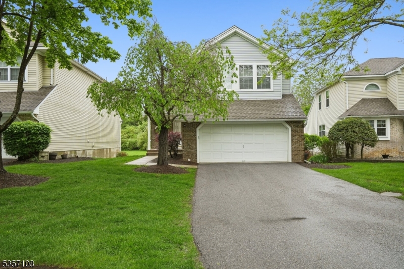 Gorgeous 3 BR, 2.5 Ba colonial, hardwood floors throughout, spacious& bright kitchen w/ granite countertops, ceramic tile, backsplash, and a full Finished Basement.  The eat in kitchen leads to a Dining Area & sliders to a private, spacious deck with space to run and play in the yard.  The upstairs features hardwood flooring throughout &  3 spacious bedrooms and 2 full baths.  The large master bedroom features its own full bath, cathedral ceilings & walk in closet.   The finished basement makes a perfect additional recreation space and features hardwood flooring , wainscoting and built in shelving.  2 car garage a huge plus!!!