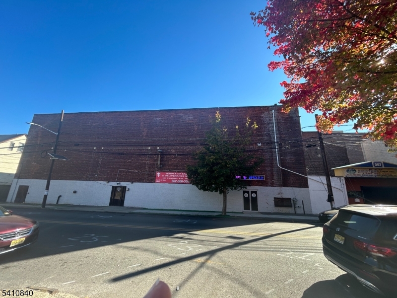 Welcome to oversized commercial building  or nonprofit for developers.  It's currently used as a house of worship, , currently tax exempt, can be developed into mixed use C 4-5 up. Approximately 16,000 sq ft of open space so you can develop to fit your desire. Survey available upon request.  Great for another Non profit or residential building. AS IS SALE! NEEDS A NEW ROOF AND CLEAN OUT.  ONE CAR WIDTH PARKING around BACK OF BUILDING, MUST HAVE HOLD HARMLESS FORM SIGNED BY EVERYONE ENTERING PREMISES.