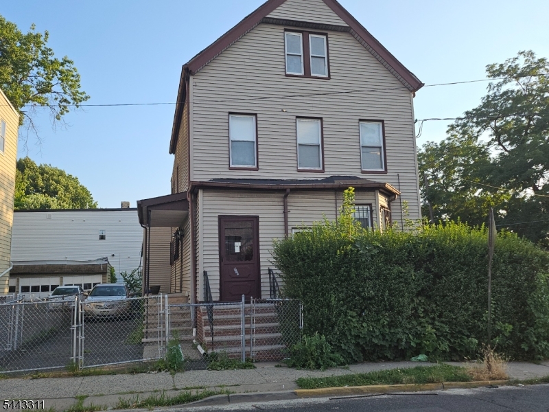 3-family property featuring a spacious 3-bedroom unit on the first floor, a 2-bedroom unit on the second floor, and a 1-bedroom unit on the third floor. The home also includes a finished basement, off-street parking for 2 cars, and a fully enclosed fenced yard. Great investment or owner-occupant opportunity. Property is being sold strictly as is.