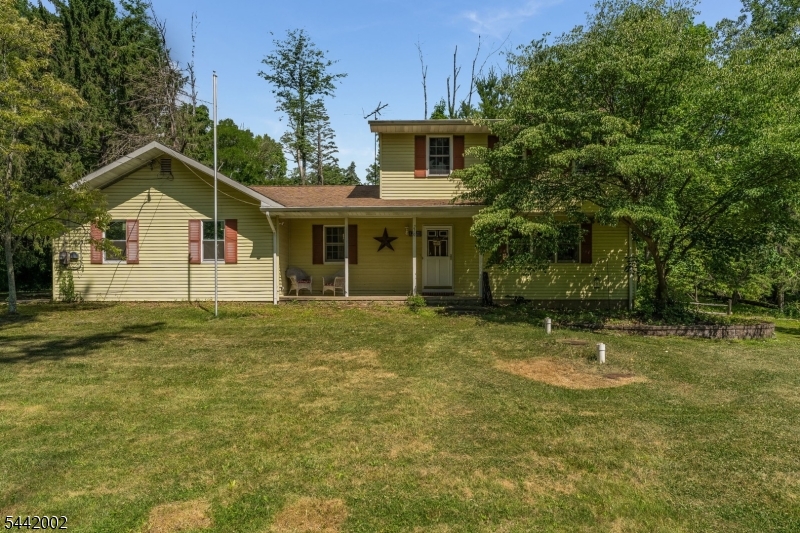 Charming 3-bedroom Colonial set on over an acre in beautiful Holland Township. Nestled in a private setting, this home offers the perfect balance of peace, privacy, and convenience. Enjoy the natural beauty of the area with the Holland Highlands Preserve just moments away, offering easy access to scenic trails and outdoor recreation. A wonderful opportunity to enjoy country living in one of Hunterdon County's most desirable locations.