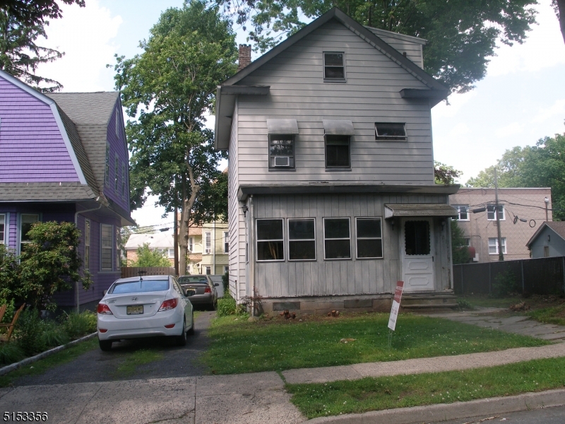 BRING YOUR  CONTRACTORS!  HOME IS BEING SOLD AS- IS!  SELLER MOTIVATED!  Walk to mid-town direct train, South Orange center shopping and near-by Seton Hall University.  Perfect commuter location.  Convenient to everything.  Owners will not remove underground oil tank before closing.