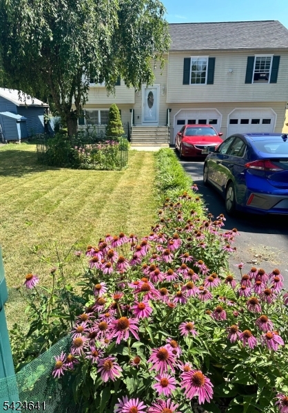 Welcome to this charming bi-level home tucked on a quiet street in Washington Borough! Offering 4 bedrooms and 2 full baths, this home features a bright and functional layout with a spacious living/dining combo, updated kitchen with center island and pantry, and a full bath conveniently located on the main level. The lower level boasts a large family room, additional bedroom, and flexible space perfect for guests, work, or play. Enjoy outdoor living on the deck overlooking a wooded, private lot complete with fencing and storage shed. Additional highlights include a 2-car built-in garage, central air, and public utilities. A wonderful opportunity to own in a desirable location close to major routes, shopping, and dining!