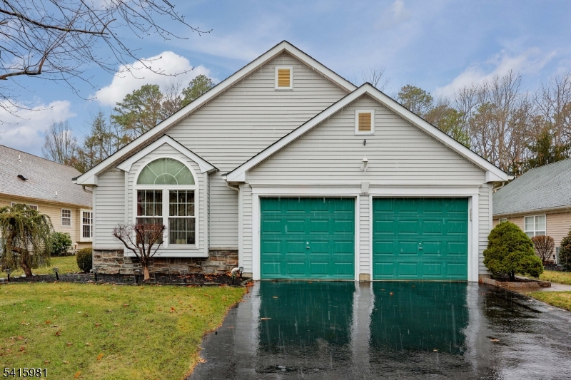 Welcome to this beautifully maintained 2-bedroom, 2-bath home in the desirable Lake Ridge 55+ community. This residence features hardwood flooring, vaulted ceilings, ceiling fans, and a gas fireplace, creating a bright and open living space. Major updates include a roof installed in 2017 and a furnace and central A/C replaced in 2019.Additional highlights include a 2-car garage and a well-maintained driveway. Lake Ridge offers low HOA fees and low taxes, along with exceptional amenities including a heated indoor pool open year-round, outdoor pool, fitness center, tennis and pickleball courts, yoga classes, bocce, billiards, library, card rooms, community bus service, social clubs, and a travel club.